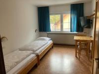 Camera Doppia con Letti Singoli