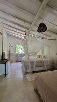 Chambre Triple - Vue sur la Piscine