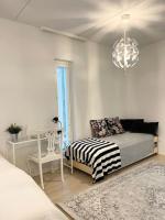 Modern studio apartment, 4 beds, free street parking with parking disc, bus stop 200m