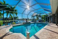 VILLA SUENO AMERICANO - 3 BEDS - 3 BATHS - 6 GUESTS - GULF ACCESS & POOL/SPA - INCL.10%OFF BOAT RENTAL - Chambres d’hôtes