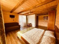 Chambre Triple – Vue sur Montagne