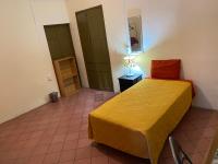 Posto Letto in Dormitorio con 3 Letti