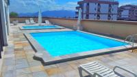 Lindo apto de 2 quartos e 2 banheiros sociais no Barramares com comércio próximo, piscina aquecida, quadras, parquinhos, brinquedoteca, empréstimo de cadeiras e barracas de praia, condomínio em frente à praia, apartamento limpíssimo, equipado, tudo novo - B&B Rio de Janeiro