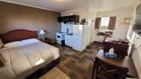 Standaard Kamer met Queensize Bed en Kitchenette