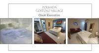 Habitación con cama grande y bañera de hidromasaje