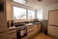 Appartement met 1 slaapkamer, balkon en uitzicht op de bergen.