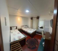 Deluxe Dreibettzimmer
