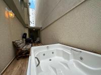 LA02- 2 Suítes +1Quarto | Jacuzzi | Churrasqueira - Chambres d’hôtes