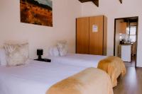 Deluxe Doppel-/Zweibettzimmer