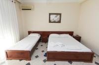 Chambre Triple avec Salle de Bains Privative