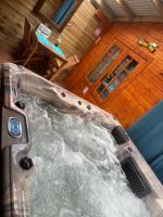 Les Chalets de Marie 974- Jacuzzi SPA privatif dans le chalet , sans vis à vis , vue mer - B&B Saint-Denis