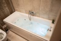 Deluxe Suite mit Whirlpool-Badewanne