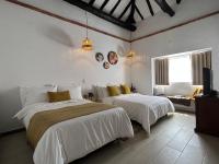 Chambre Quadruple avec Salle de Bains Privative