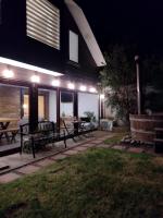 Acogedora Casa con Tinaja y Jacuzzi y RENT A CAR - B&B Puerto Varas