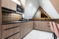 Apartment with mezzaine, bedroom and balcony
