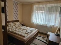 Kamer met Queensize Bed en Uitzicht op de Tuin