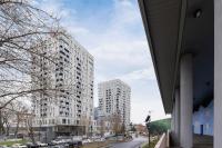Exclusive Apartment in Katowice with Balcony, Parking, Gym and Sauna by Noclegi Renters - B&B