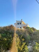 Les Oliviers Sunset Villa Sea view on Petani Beach - B&B Vóvykes