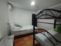 Chambre Quadruple avec Salle de Bains Privative