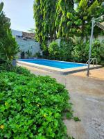 B&B Lomé - Escapade dans un jardin avec piscine - Bed and Breakfast Lomé