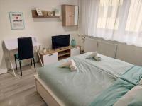 B&B Debrecen - AwesHome City Apartment - Bed and Breakfast Debrecen