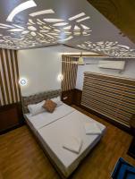 Suite mit Kingsize-Bett und Balkon