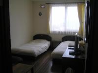 Zweibettzimmer mit Gemeinschaftsbad
