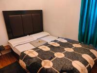 Zimmer mit Queensize-Bett