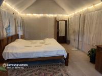 Camera Matrimoniale Deluxe (2 Adulti + 1 Bambino) 