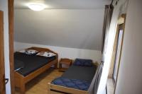 Chambre Triple avec Salle de Bains Commune