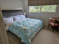 Kamer met Kingsize Bed en Uitzicht op de Tuin