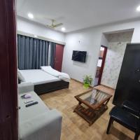 B&B Indore - Leela Home stay Indore - Marigold - One bedroom with kitchen and large balcony - Bed and Breakfast Indore