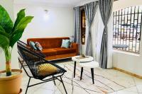 Cozy Living by Miranda, Acacia - 2 BDR, 4 beds, 3 Bthrms, Unlimited WIFI, Free Parking, Netflix - B&B Kampala