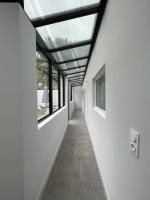 Chez Oma I 1 appartement indépendant OPI I 3 chambres privatives avec salle d eau et salon commun cuisine commune WC commun patio commun - B&B