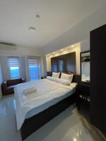 B&B Surabaya - Orchard Apartment Pakuwon Mansion 2 by Shinzhouz - Bed and Breakfast Surabaya