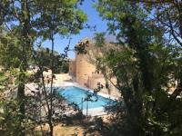 Appartement 2ème étage 4 personnes dans Château avec piscine collective - Chambres d'hôtes Lussan