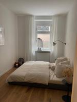 BG Living & Hosting - Stilvolle Mosel-Ferienwohnung "Alte Apotheke" in Ürzig - 2 Schlafzimmer, bis 5 Personen, Fahrradkeller & WLAN - Ferienwohnung Ürzig