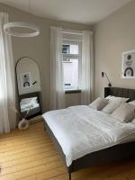 BG Living & Hosting - Exklusive Jugendstilwohnung an der Mosel in Ürzig - 2 Schlafzimmer, bis 4 Personen, Fahrradkeller, Waschmaschine & Trockner - Chambres d'hôtes Ürzig