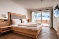 Alpin Lodges - Moderne Appartements mit Zugang zu 3000 qm SPA Panoramahotel Oberjoch - B&B Bad Hindelang