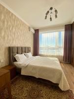 Экспо Мега двухкомнатные апартаменты - Bed and Breakfast
