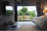 Chambre Quadruple avec Douche