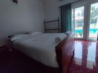 Tweepersoonskamer met Uitzicht op het Zwembad