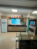 Apartamento com 3 suítes a 300 metros da praia - B&B Itapema