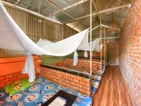 Cama en habitación compartida con 4 camas