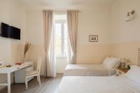 Chambre Triple - Vue sur Ville