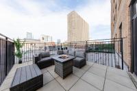 McCormick Place 2BR Suite with Patio, Skyline View and Optional Parking Sleeps 6 Near Soldier Field and Grant Park - B&B Chicago