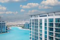 luxury living with private beach at district one - B&B
