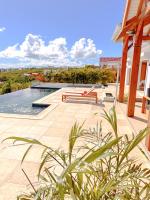 Résidence Les Raisins Clairs - Villas standing 4 étoiles , vue sur mer panoramique & piscine à débordement - Chambres d'hôtes Saint-François