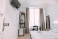 Camera Matrimoniale/Doppia con Letti Singoli con Bagno in Comune