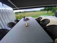 Vackert boende med utsikt över fantastisk golfbana - Bed and Breakfast